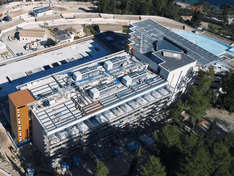 Aerial view of heavy-duty metal bases for HVAC and air conditioning systems under construction at a large hotel in Corfu.